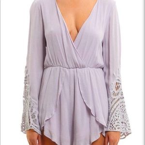 Lavender long sleeve lace romper by Dee Elle
